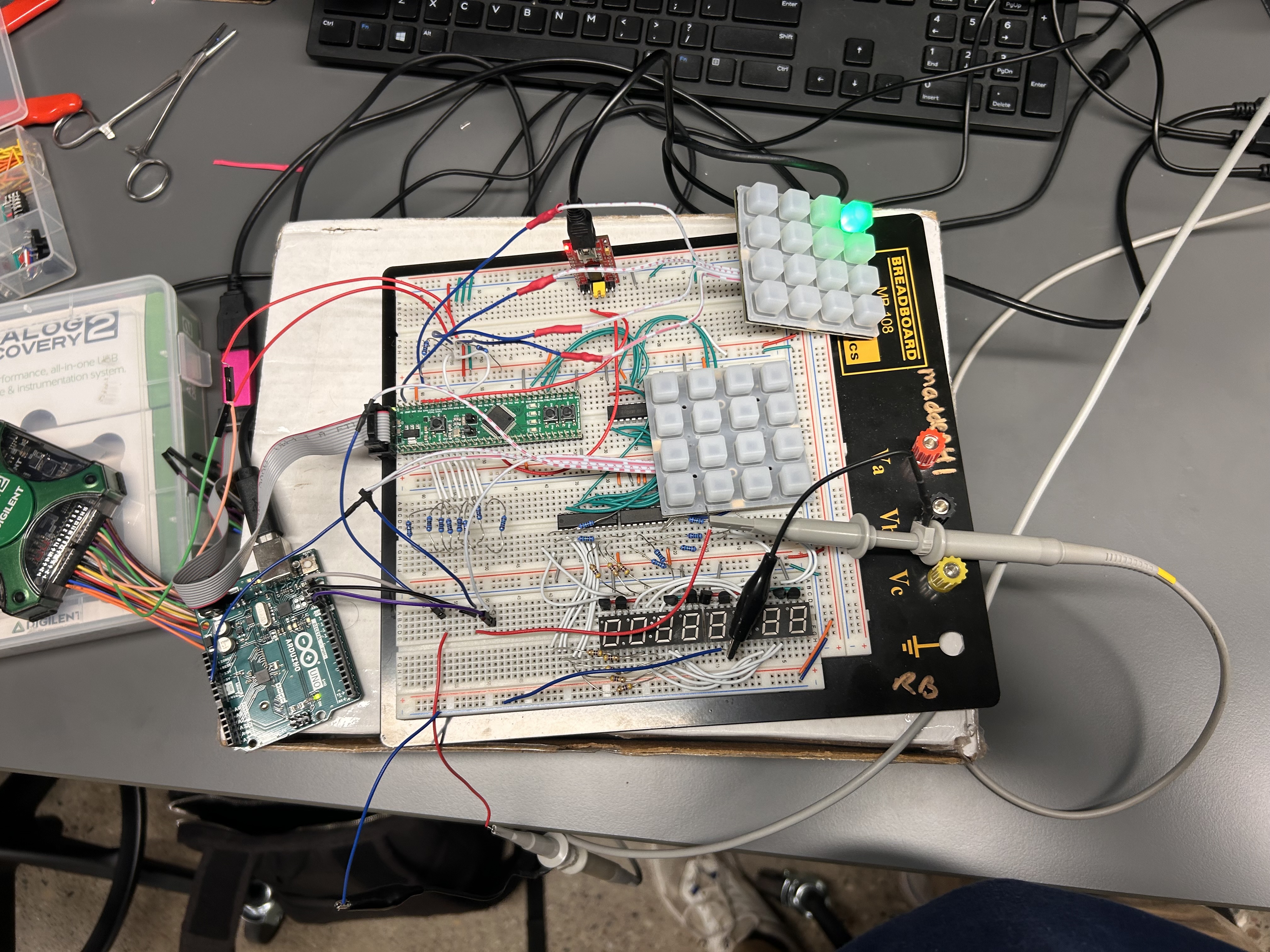 Arduino breadboard setup used to mirror the keypad behaviour